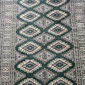 Fine Hand-Knotted Pakistani Bokhara Wool Rug – 15.5x10.3 ft – Deep Green, Excell